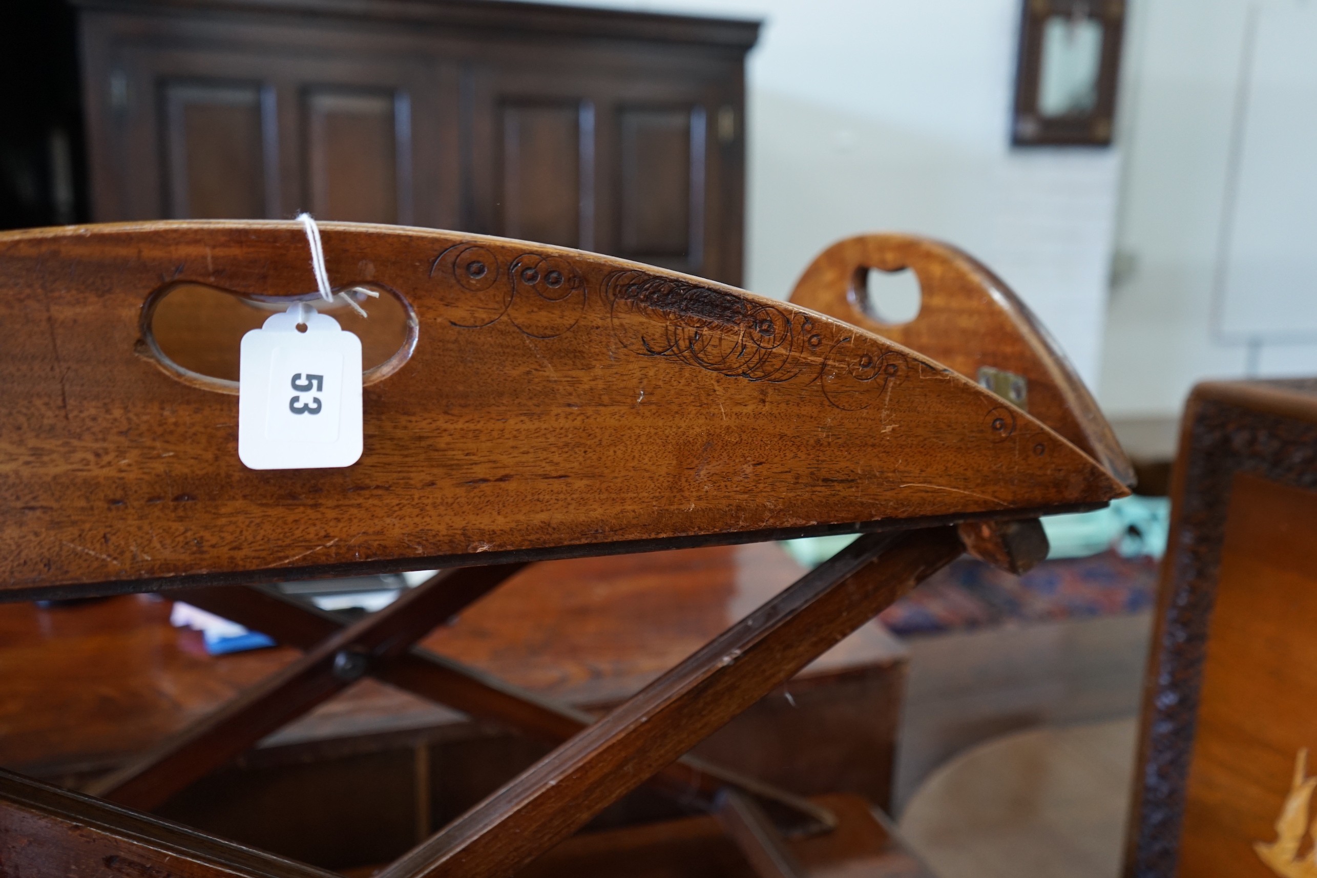 A Victorian mahogany folding butler’s tray, width 91cm, depth 63cm, height 41cm on later stand